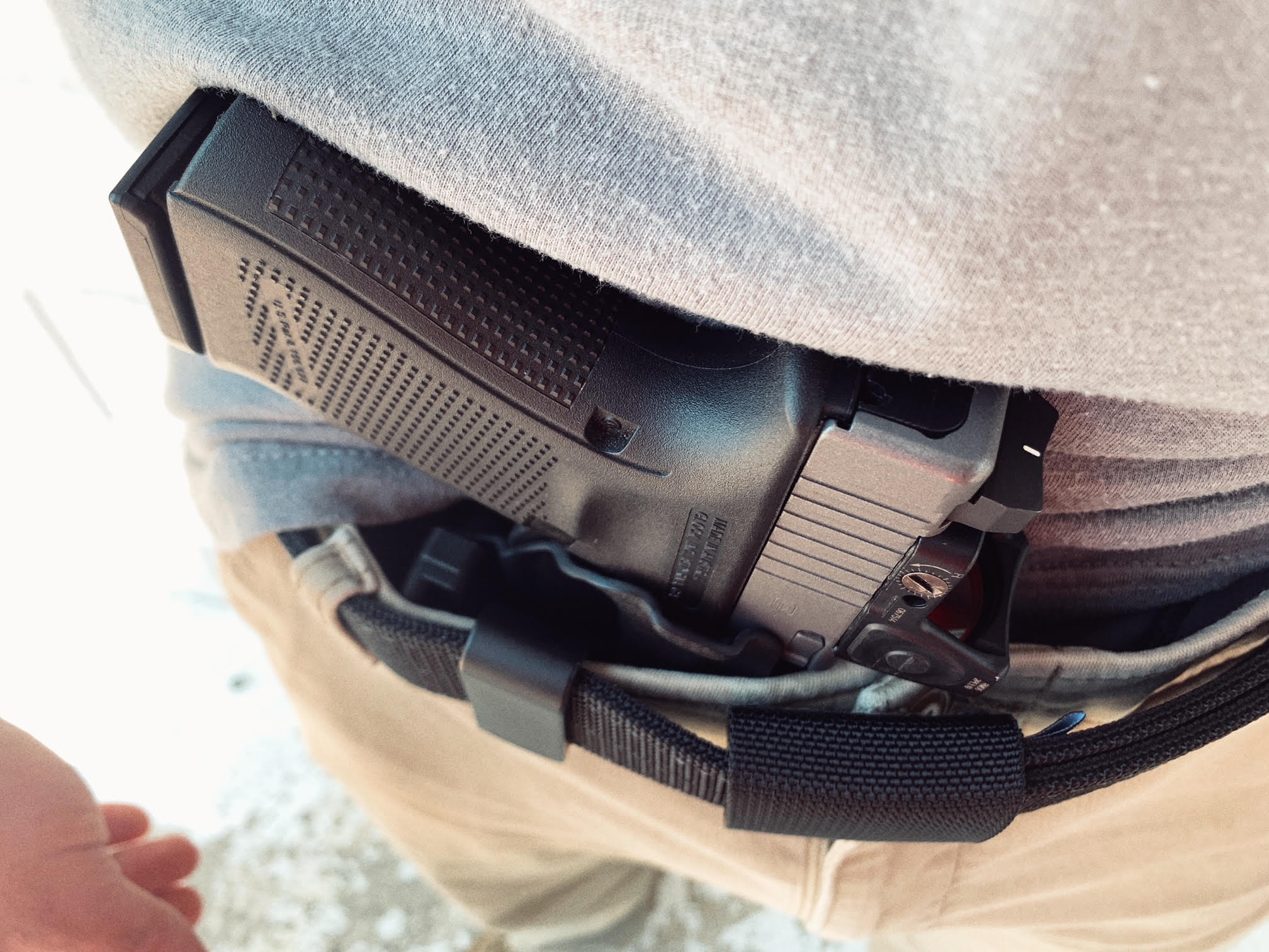 Minimalist AIWB Holster with Concealment Claw Minimalist Dara AIWB holster showing proper grip concealment claw placement
